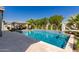 Inviting pool with spacious deck and a basketball hoop at 15320 W Baden St, Goodyear, AZ 85338
