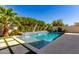 Relaxing pool area with water feature and basketball at 15320 W Baden St, Goodyear, AZ 85338