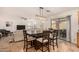 Eat-in kitchen with a large island and view of the backyard at 16958 W Marconi Ave, Surprise, AZ 85388