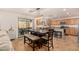 Kitchen with light wood cabinets, granite countertops, and an island at 16958 W Marconi Ave, Surprise, AZ 85388