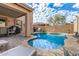 Inviting kidney-shaped pool with flagstone decking at 16958 W Marconi Ave, Surprise, AZ 85388