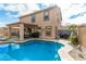 Two-story home with backyard pool and patio at 16958 W Marconi Ave, Surprise, AZ 85388