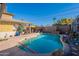 Large, kidney-shaped pool with plenty of space for relaxation and fun at 1727 S Ventura Dr, Tempe, AZ 85281