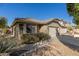 House exterior with a two-car garage and landscaping at 20212 N 33Rd St, Phoenix, AZ 85050