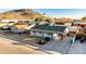 Aerial view of a ranch house near mountains at 2025 W Wood Dr, Phoenix, AZ 85029