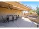 Covered patio with seating area and ceiling fan at 20716 N Shadow Mountain Dr, Surprise, AZ 85374