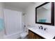 Updated bathroom with a vanity, sink, and bathtub at 2220 W Dora St # 215, Mesa, AZ 85201