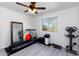 Home gym with treadmill, exercise bike, and weights at 2220 W Dora St # 215, Mesa, AZ 85201