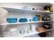 Well-organized pantry with ample shelving at 2220 W Dora St # 215, Mesa, AZ 85201