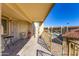 Spacious patio with seating area, overlooking community pool at 2220 W Dora St # 215, Mesa, AZ 85201