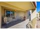 Private patio with chairs and table, perfect for relaxing at 2220 W Dora St # 215, Mesa, AZ 85201