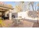 Outdoor patio with seating area and a wall fountain at 2472 E Vermont Dr, Gilbert, AZ 85295