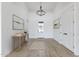 Spacious entryway with high ceilings, wood floors, and elegant chandelier at 27016 N 153Rd Dr, Surprise, AZ 85387