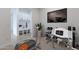 Home gym with elliptical, treadmill, and weight equipment at 27016 N 153Rd Dr, Surprise, AZ 85387