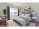 Bright bedroom featuring a comfortable bed and stylish decor at 27017 N 153Rd Dr, Surprise, AZ 85387