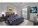 Cozy bedroom with grey bedding and playful decor at 27035 N 153Rd Dr, Surprise, AZ 85387