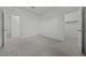 Bedroom with neutral carpet, white walls, two closets, and two doors at 2937 E Lawndale Ct, Gilbert, AZ 85298