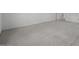 Spacious bedroom featuring neutral carpet and paint, with a white door at 2937 E Lawndale Ct, Gilbert, AZ 85298