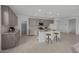 Spacious kitchen with stainless steel appliances, granite counters, large island with seating at 2937 E Lawndale Ct, Gilbert, AZ 85298