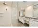 Modern bathroom with double vanity and large shower at 29460 N 123Rd Gln, Peoria, AZ 85383