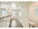 Large bathroom with double vanity and walk-in shower at 29460 N 123Rd Gln, Peoria, AZ 85383