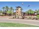 Gated community entrance with a guardhouse and landscaping at 29460 N 123Rd Gln, Peoria, AZ 85383