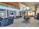 Community Lobby with comfortable seating and large screen TV at 29460 N 123Rd Gln, Peoria, AZ 85383