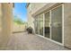 Brick paved patio with sliding glass doors at 29460 N 123Rd Gln, Peoria, AZ 85383