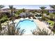 Community pool with surrounding lounge chairs at 29460 N 123Rd Gln, Peoria, AZ 85383