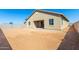 Large backyard with block wall and desert landscaping at 31550 N Hayweather Ln, San Tan Valley, AZ 85143