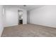 Light and airy bedroom with carpeting and ensuite bathroom access at 31550 N Hayweather Ln, San Tan Valley, AZ 85143