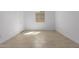 Spacious bedroom featuring a large window and tile flooring at 31550 N Hayweather Ln, San Tan Valley, AZ 85143