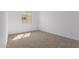 Bright bedroom with carpeted floor and a window at 31550 N Hayweather Ln, San Tan Valley, AZ 85143
