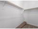 Walk-in closet with wood shelving and carpeted flooring at 31550 N Hayweather Ln, San Tan Valley, AZ 85143