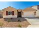 One-story house with a two-car garage and desert landscaping at 31550 N Hayweather Ln, San Tan Valley, AZ 85143