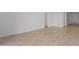Bright hallway with tile floors and access to bedrooms at 31550 N Hayweather Ln, San Tan Valley, AZ 85143