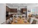 Eat-in kitchen with stainless steel appliances and an island at 31550 N Hayweather Ln, San Tan Valley, AZ 85143