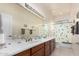 Bathroom with double sinks and a shower/tub combo at 31825 N 141St St, Scottsdale, AZ 85262