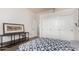 Bedroom with a queen bed and built-in shelving unit at 31825 N 141St St, Scottsdale, AZ 85262