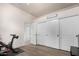 Bedroom with a Peloton bike and large closet at 31825 N 141St St, Scottsdale, AZ 85262