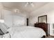Bedroom with a queen bed, large closet, and ceiling fan at 31825 N 141St St, Scottsdale, AZ 85262