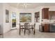 Bright kitchen nook with view and access to backyard patio at 31825 N 141St St, Scottsdale, AZ 85262