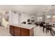 Open kitchen with island and views into living area at 31825 N 141St St, Scottsdale, AZ 85262