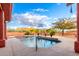 Relaxing pool area with pergola and lush landscaping; inviting spa at 31825 N 141St St, Scottsdale, AZ 85262