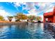 Inviting pool with waterfall feature and expansive patio at 31825 N 141St St, Scottsdale, AZ 85262