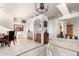 Built-in wet bar with wood cabinets and tile flooring at 31825 N 141St St, Scottsdale, AZ 85262