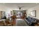 Relaxing living room with hardwood floors, a piano, and access to patio at 3315 E Malapai Dr, Phoenix, AZ 85028