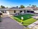 Artificial turf backyard with covered patio at 3317 N 17Th Ave, Phoenix, AZ 85015