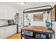 Modern kitchen with white cabinets, butcher block island, and stainless steel appliances at 3317 N 17Th Ave, Phoenix, AZ 85015