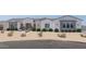 Beautiful farmhouse exterior with landscaping and desert accents at 3640 W Josiah Trl, Queen Creek, AZ 85144